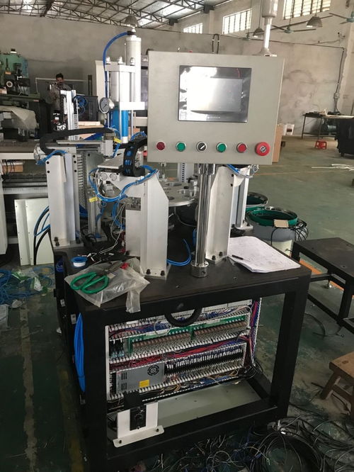 工廠自動化設備在鉚釘組裝中的應用 以照相器材為例